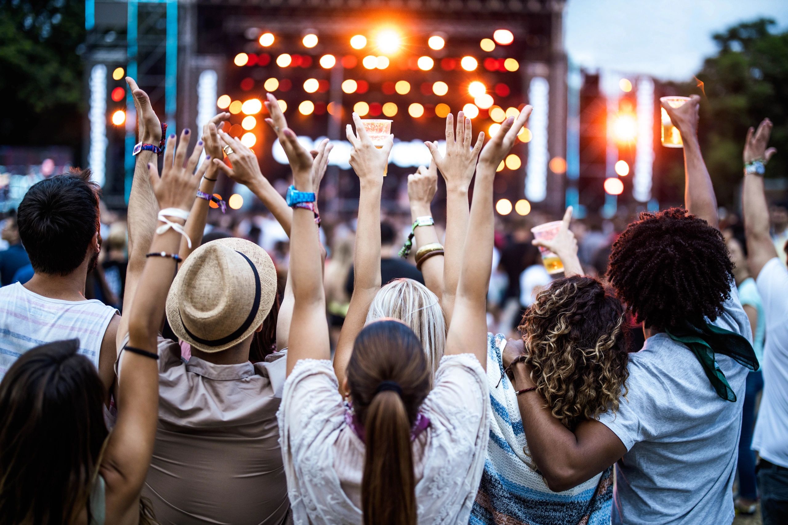 festival crowd at sunset